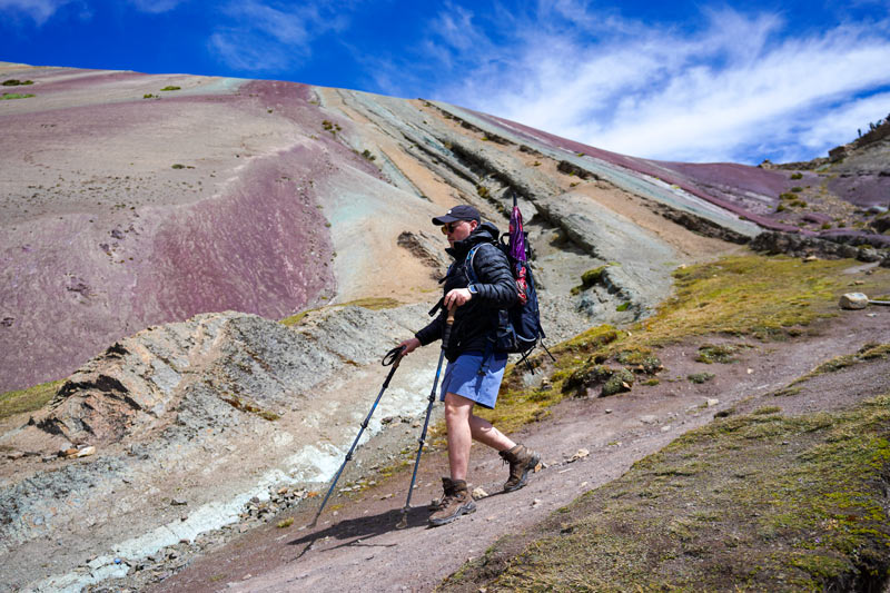 Tourist descending Rainbow Mountain