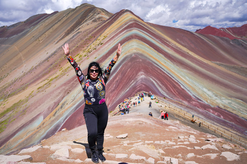 Tourist on the Rainbow Mountain