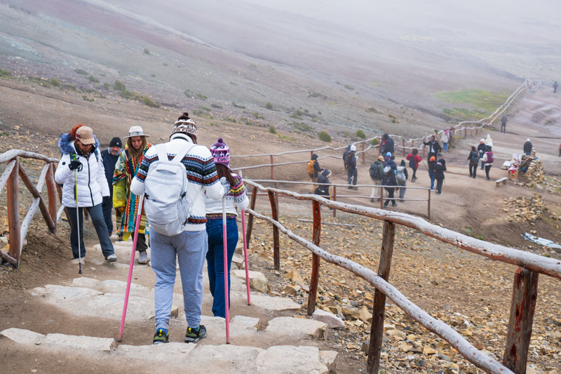 Tourists descending Rainbow Mountain
