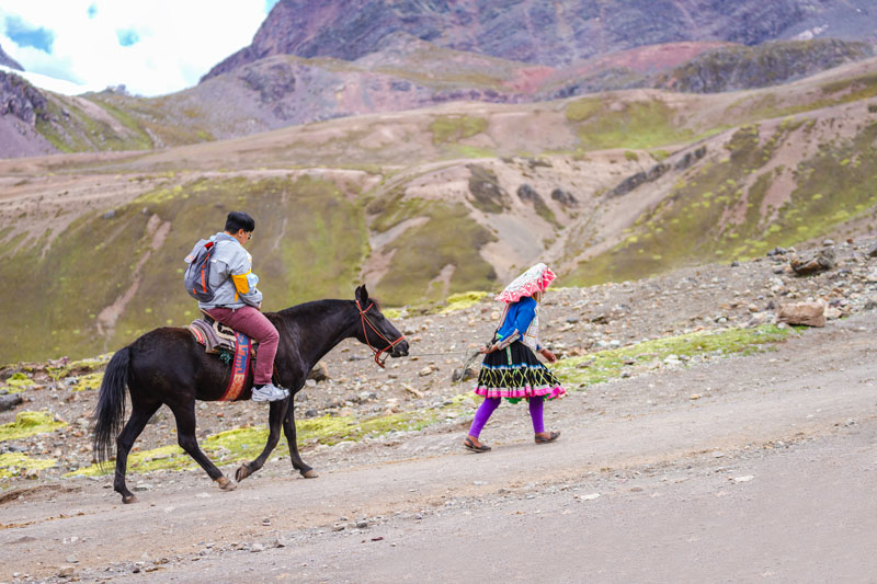 Tourist heading to Rainbow Mountain