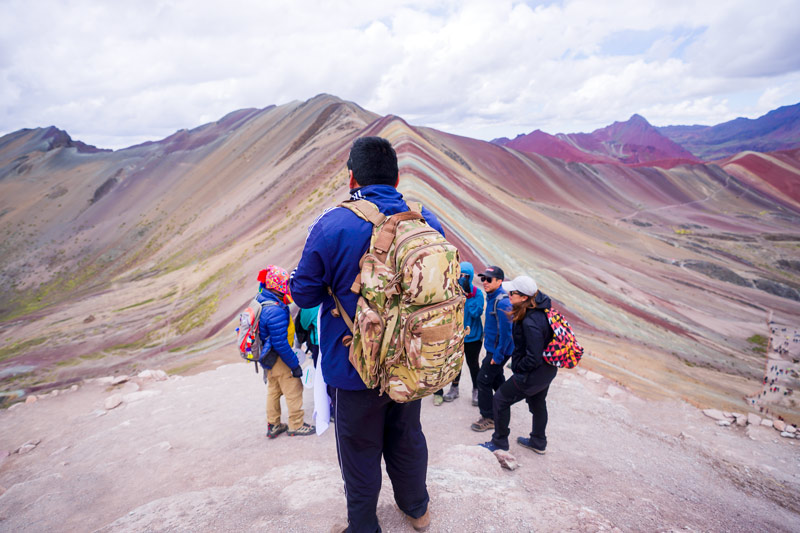 Tourist on the Rainbow Mountain